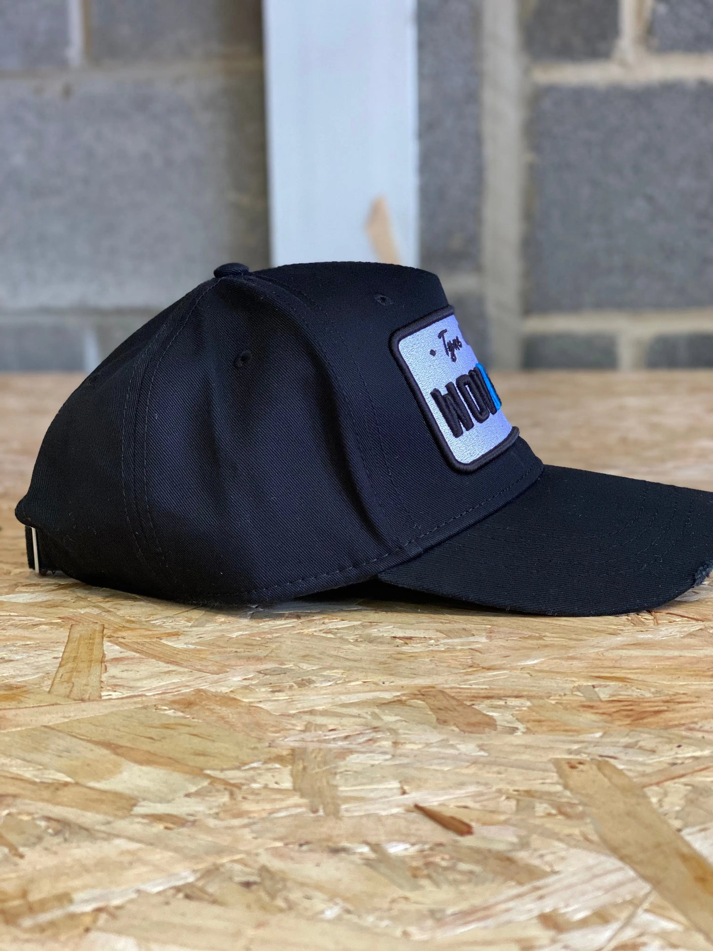 Black Plate Cap: Woven Inc Edition.