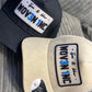 Black Plate Cap: Woven Inc Edition.